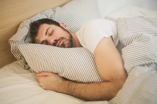 man sleeping well