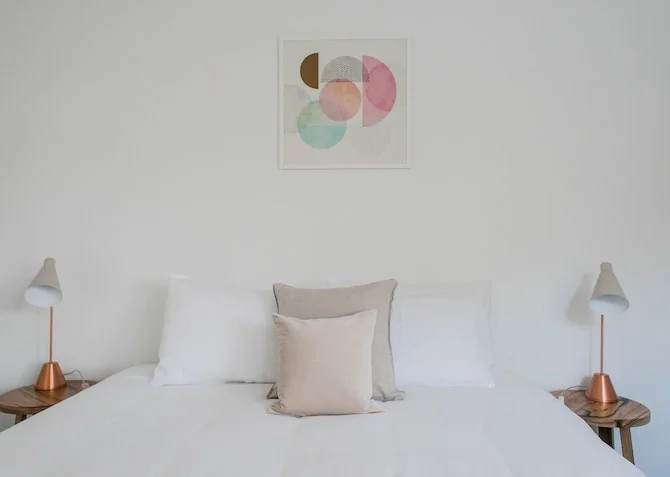 clean and fresh bed with white bedding