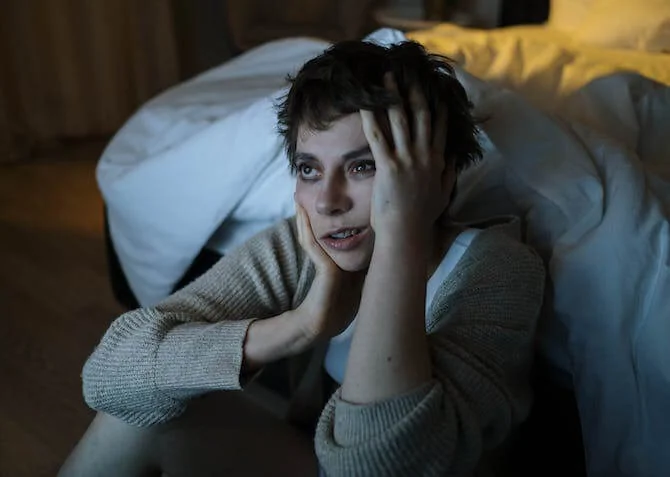 woman so stressed she can't sleep