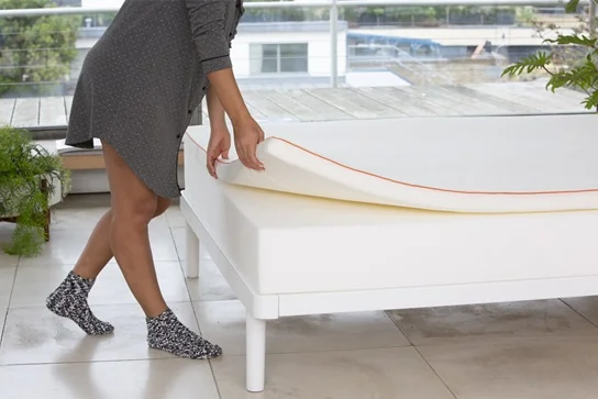 placing a mattress topper on mattress