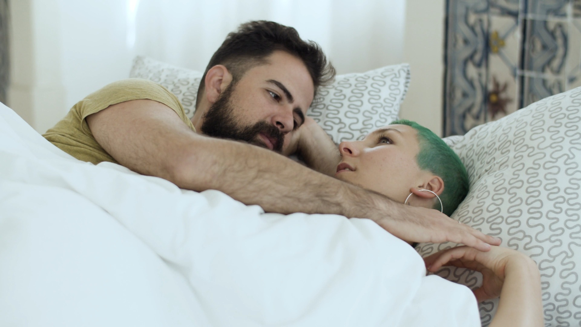 Couple talking in Bed